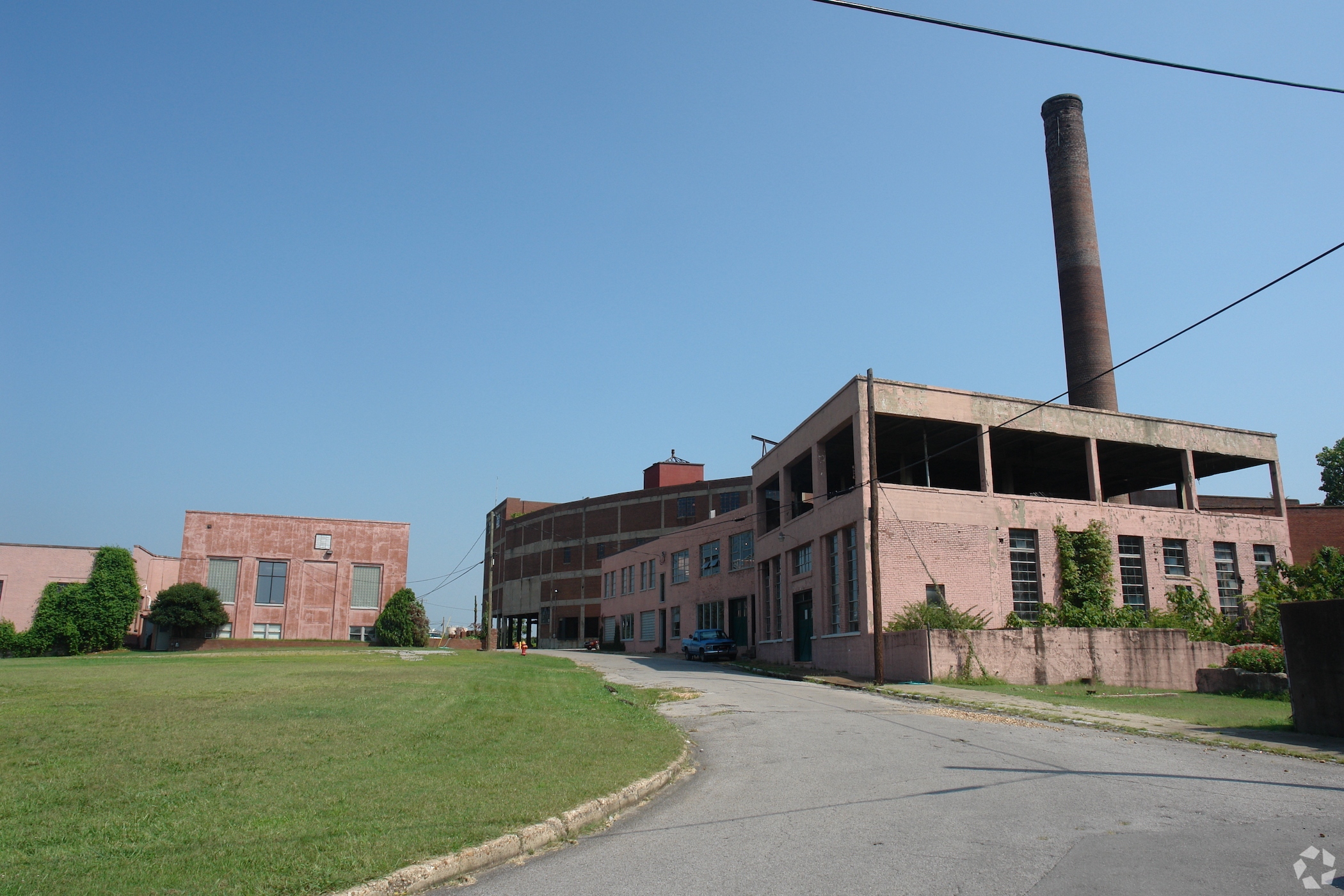 Cousins Properties has bought into the redevelopment of the former Neuhoff Packing slaughterhouse in Nashville, which includes the existing buildings. (CoStar)