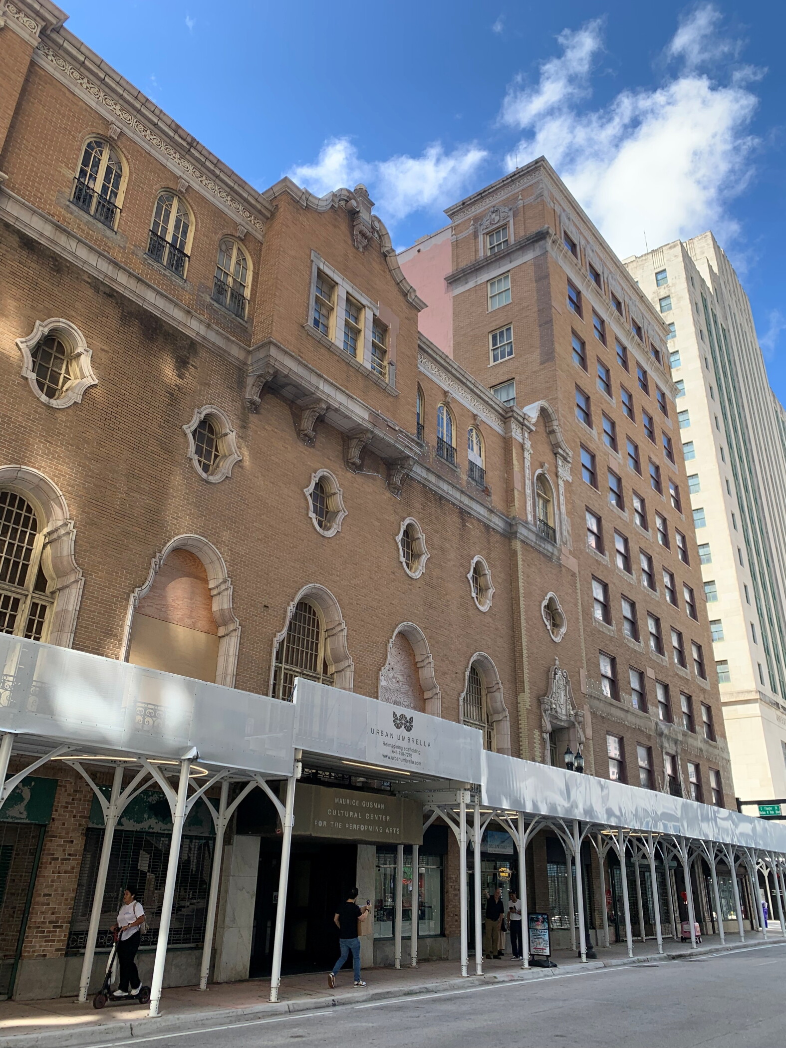 The Olympia Theater in downtown Miami has been sold to Pitbull's Slam charter school. The theater is expected to be renovated, while the school will operate in the adjoining 10-story office building. (Joshua S. Andino/CoStar)