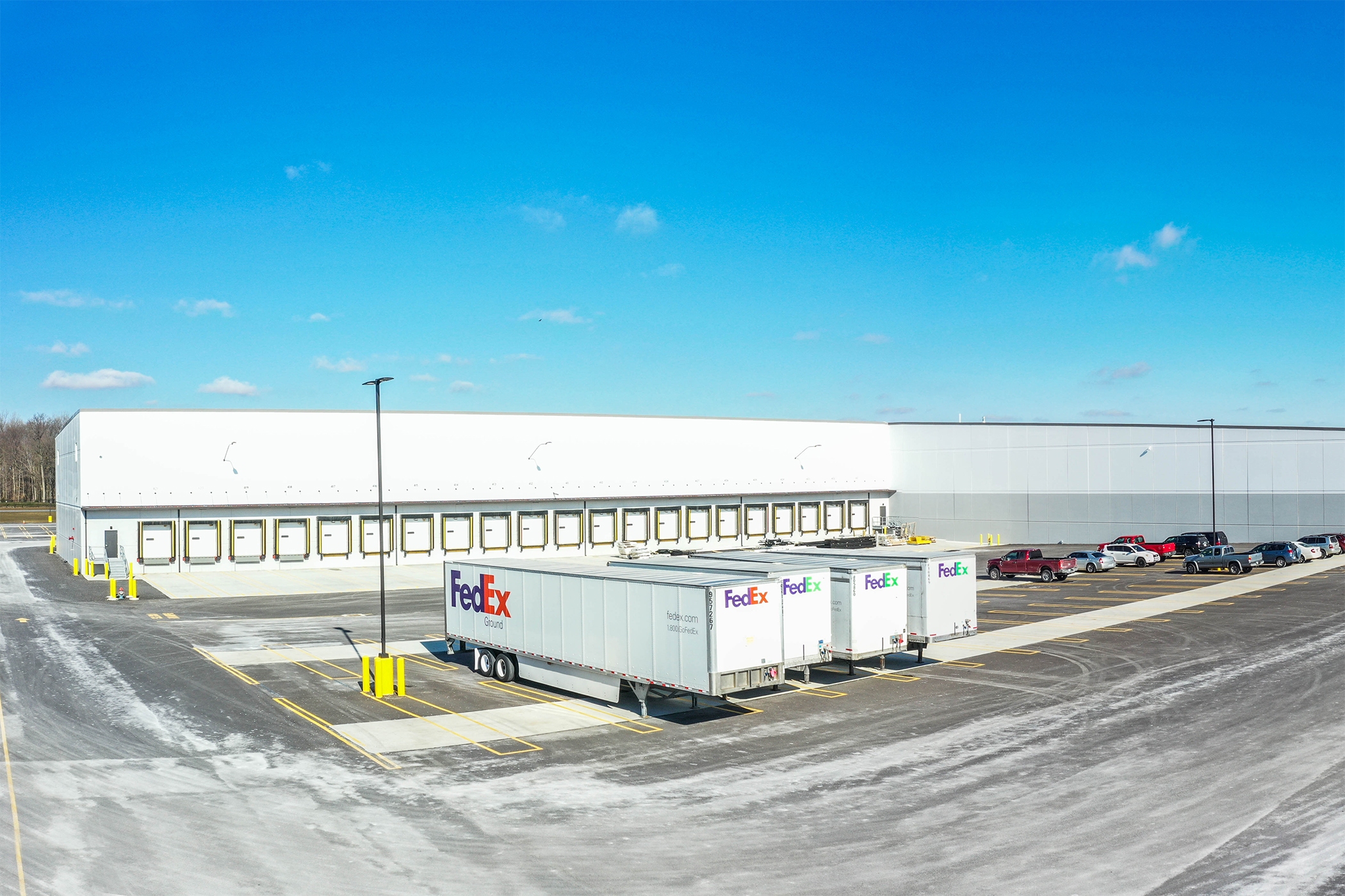Monmouth Real Estate Acquires Home Depot and FedExLeased Warehouses