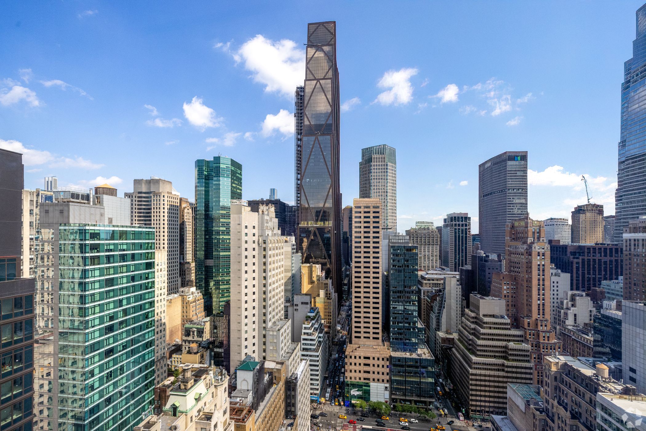 JPMorgan Chase is gradually opening its new headquarters at 270 Park Ave. in Midtown Manhattan, at center, to thousands of its employees. (CoStar)