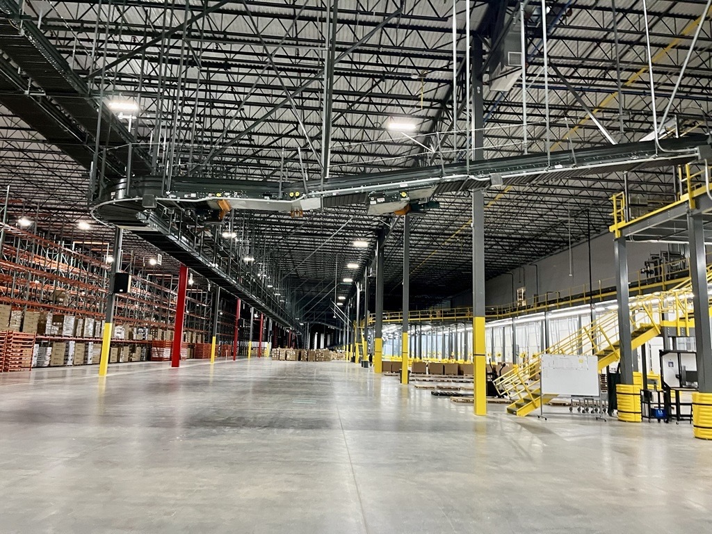 Dick's Sporting Goods has conveyor belts that run far off the ground, helping products move from receiving to shipping at the other end of the warehouse. (Candace Carlisle/CoStar)