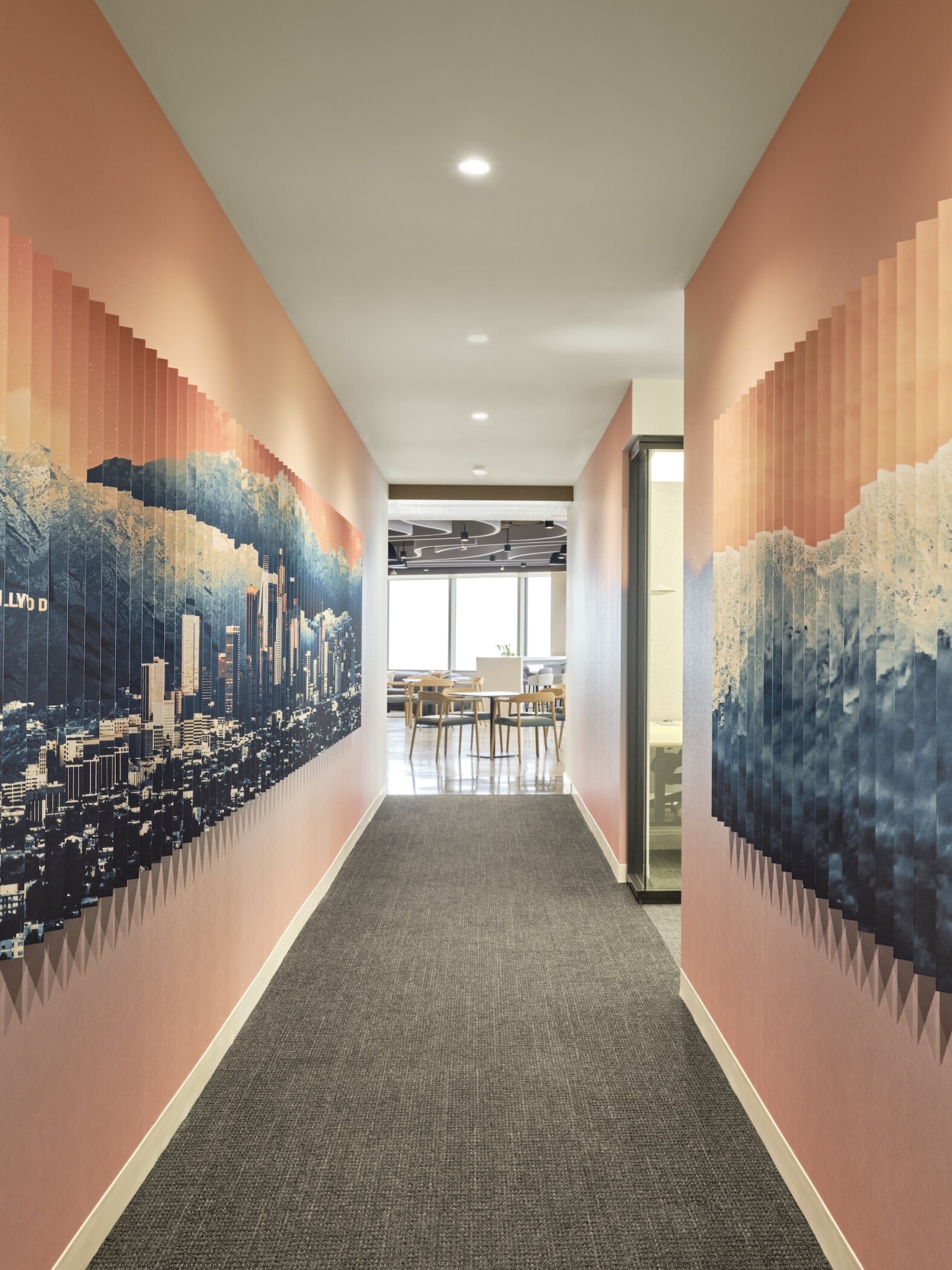 Murals are among art fixtures displayed throughout the new amenity floor. (JTM Construction Group)