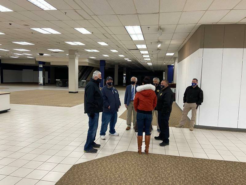Essex County Executive Joseph DiVincenzo Jr., far left, tours the closed Sears at the Livingston Mall. (Essex County executive Facebook page) 