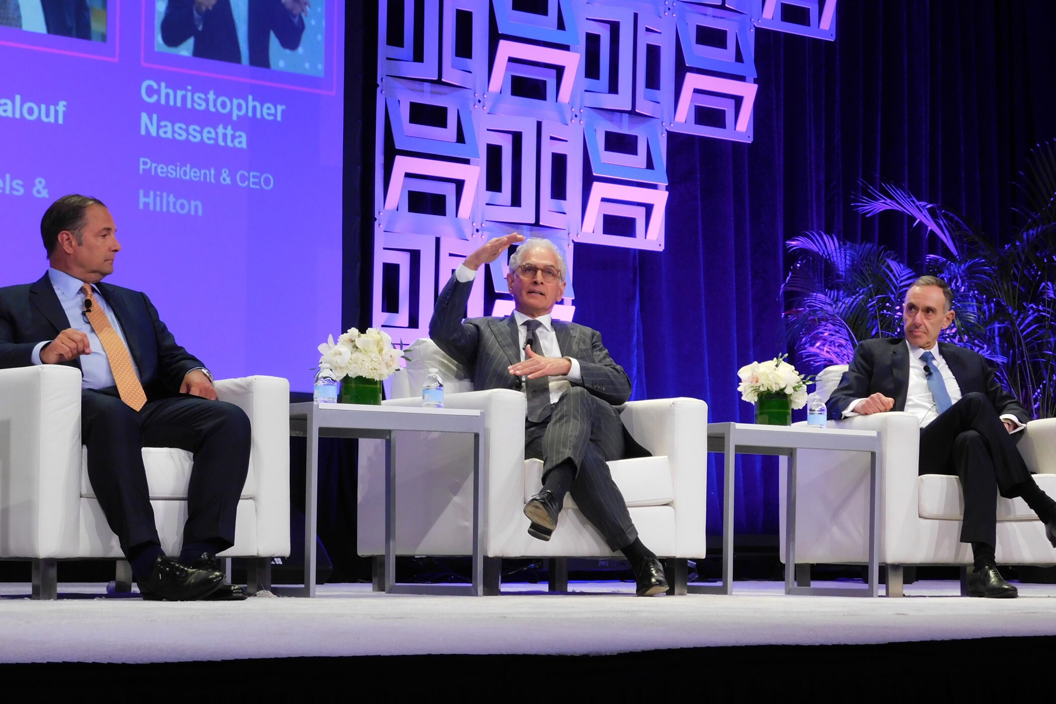From left: Marriott International President and CEO Tony Capuano, Hyatt Hotels Corp. President and CEO Mark Hoplamazian and IHG Hotels & Resorts CEO Elie Maalouf talk about the value of experiential travel at the NYU IHIF on Monday. (Stephanie Ricca)