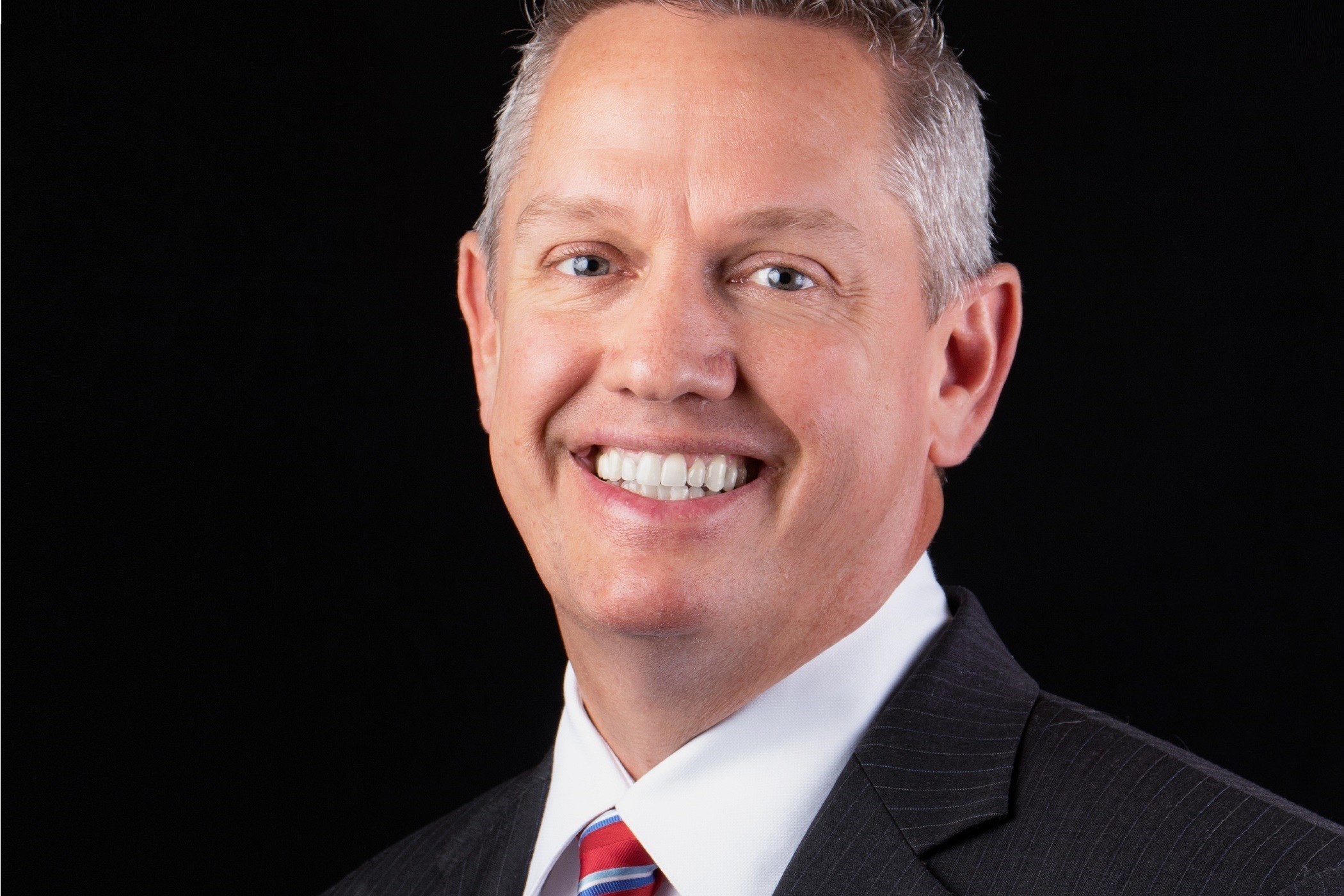 John Crossman, a frequent public speaker and booster for diversity in the commercial real estate industry, is retiring. (Courtesy of Crossman &amp; Company)