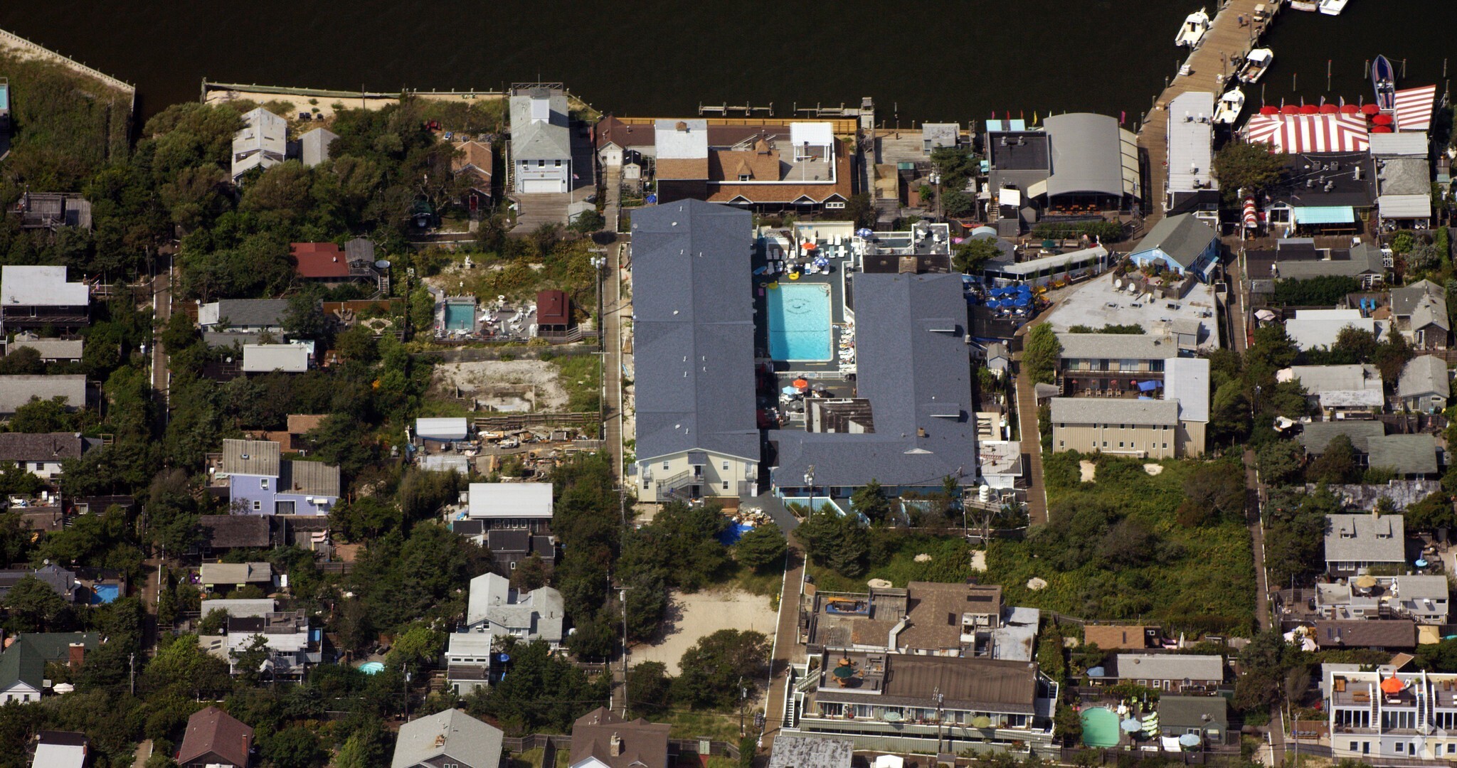 The waterfront property has direct beach access and is close to a main ferry dock. (CoStar)