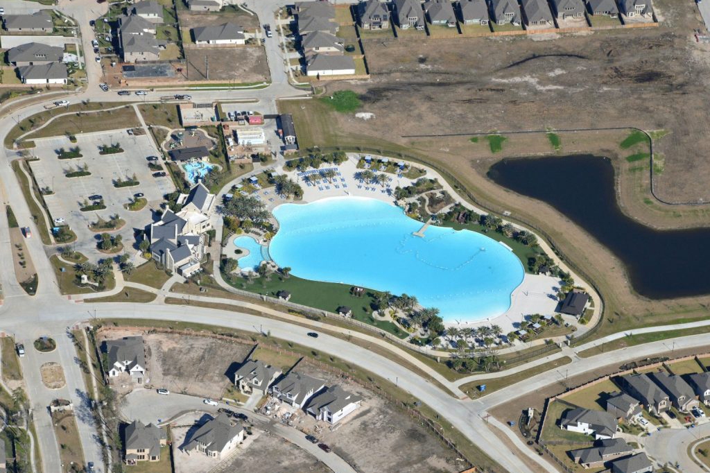 Among Land Tejas’ single-family home neighborhoods is Balmoral, a 750-acre development in suburban Houston that was the first in Texas to open with an artificial lagoon for residents. (Land Tejas)