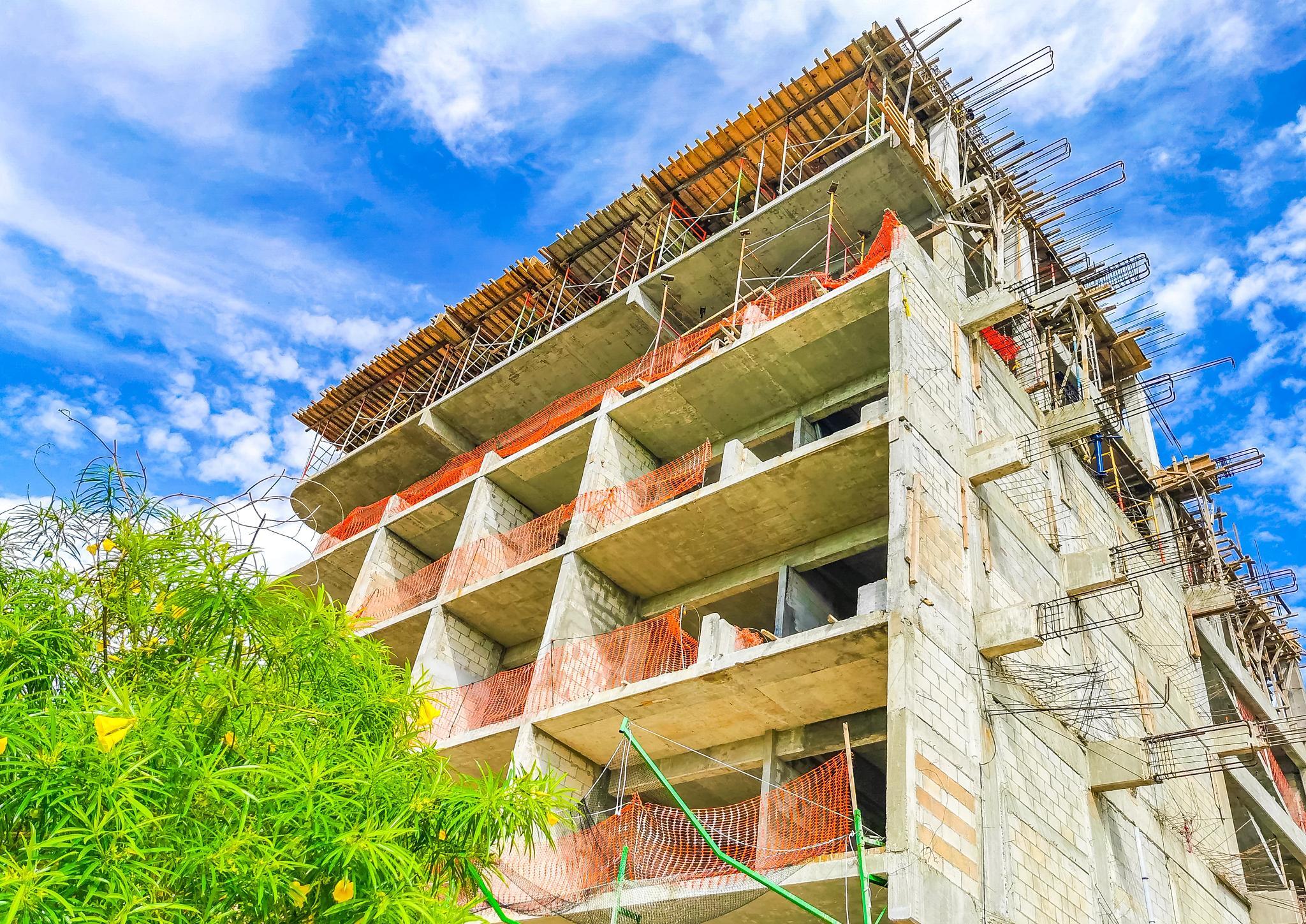 Hoteliers say there's a large supply of empty office spaces and independent hotels across Latin America that are suitable for conversions. Shown here is the construction of a hotel complex in Playa del Carmen, Mexico. (Getty Images)