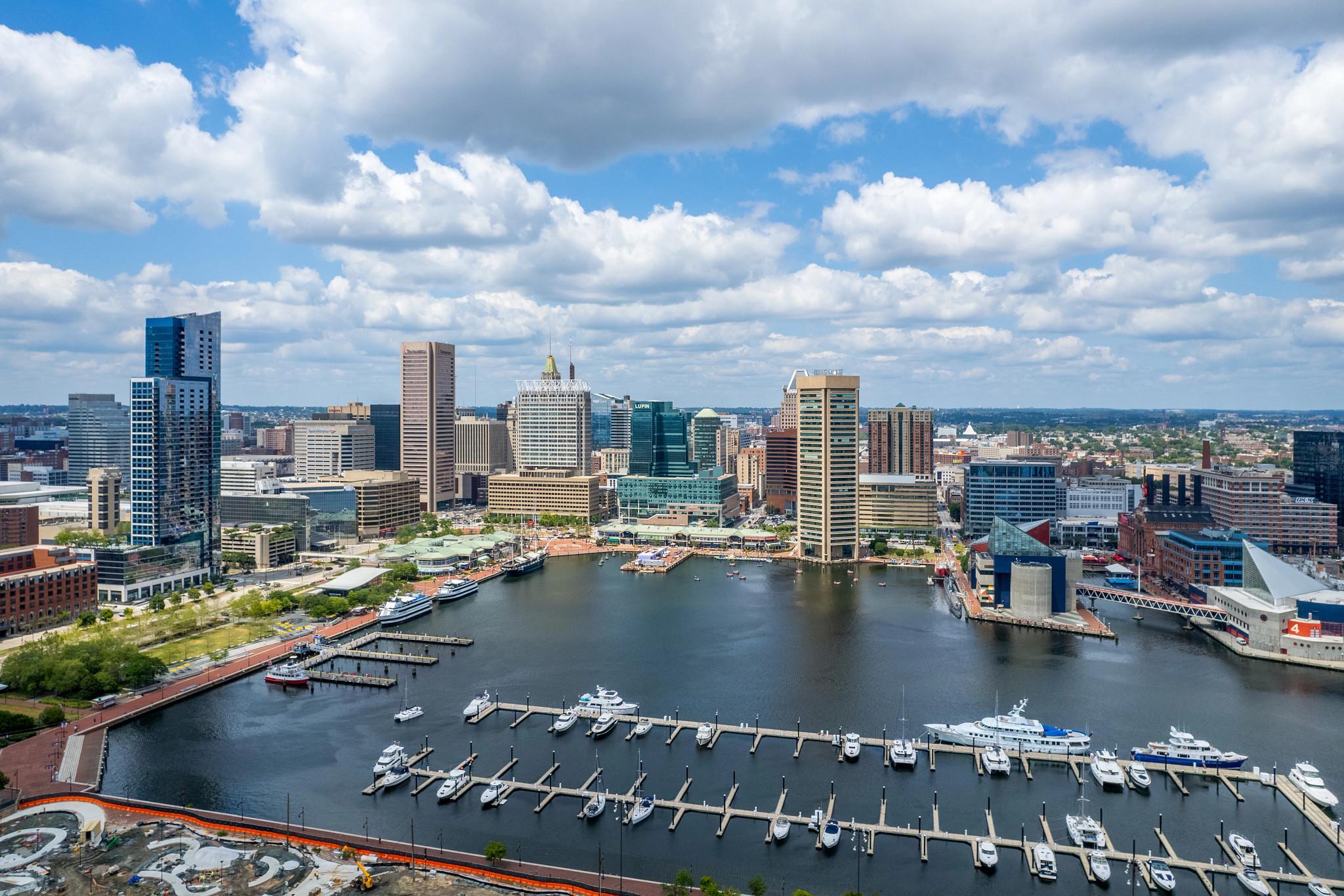 Aerial photography of Baltimore, MD's Inner Harbor, with the central business district in the background (Robert Isacson/CoStar)