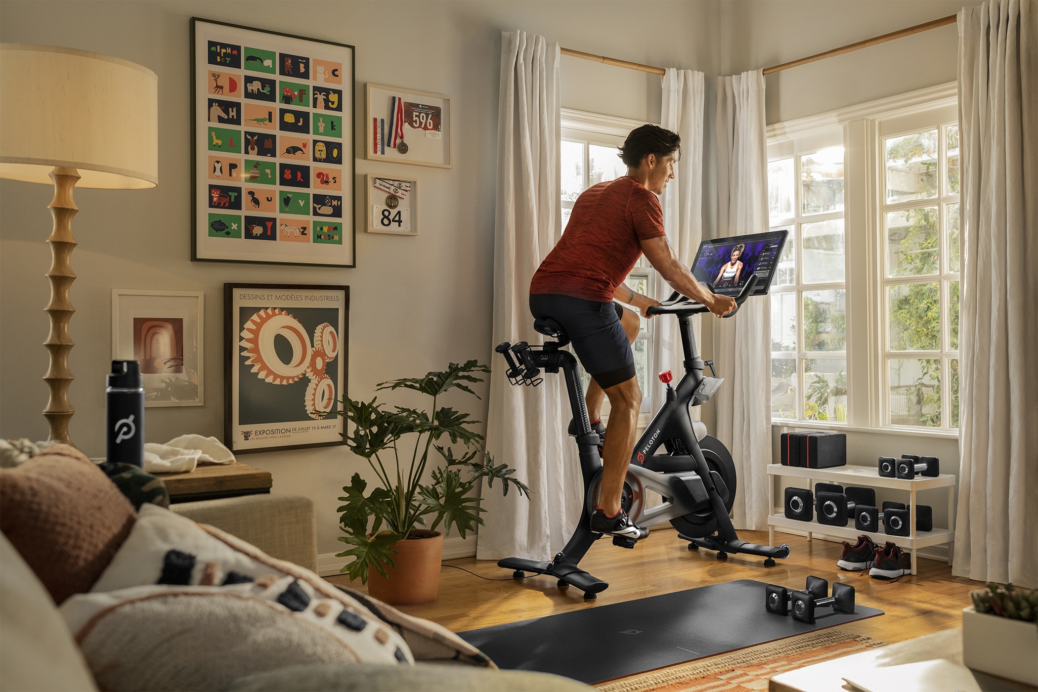 Indoor fitness equipment company Peloton reported an almost 130% increase in quarterly revenue, driving its plan to boost its U.S. industrial footprint. (Peloton) 