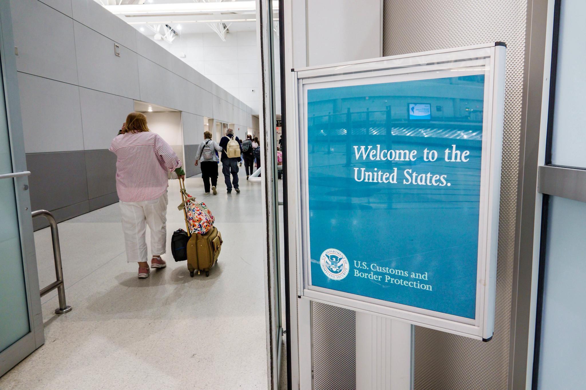 Miami, Florida, MIA Miami International Airport, terminal welcome sign US Customs and Border Protection. (Photo by: Jeffrey Greenberg/Universal Images Group via Getty Images) (Jeffrey Greenberg/Universal Imag)