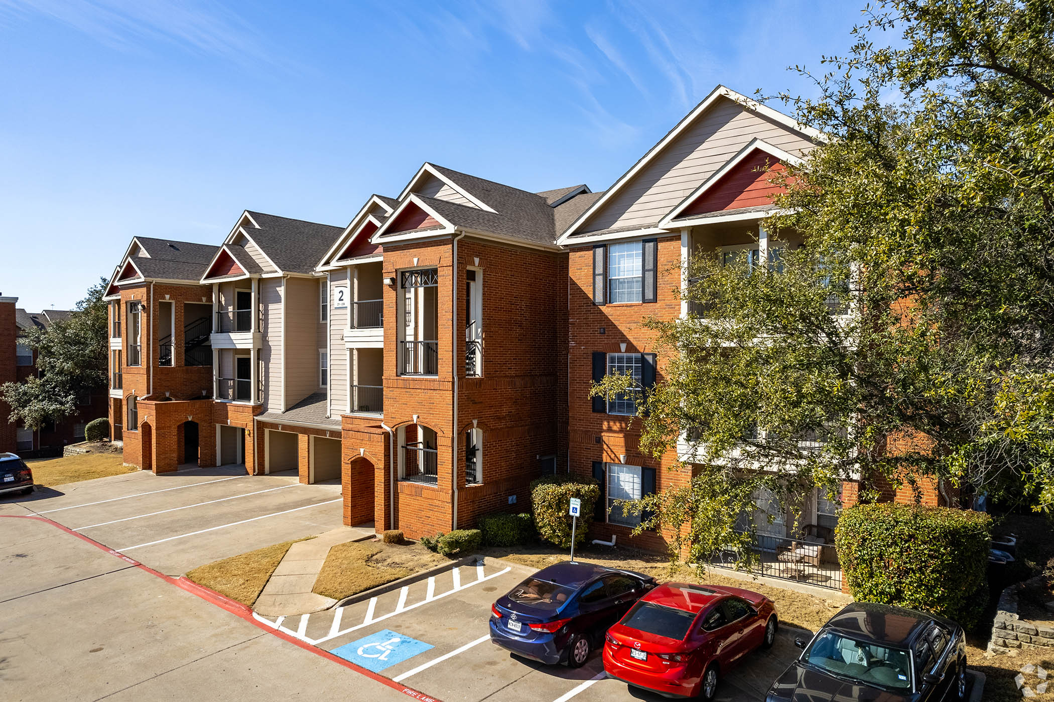 Among Bridge Investment Group's property holdings is this 1,183-unit apartment complex at 300 E. Round Grove Road in Lewisville, Texas. (Adnan Jebbeh/CoStar)