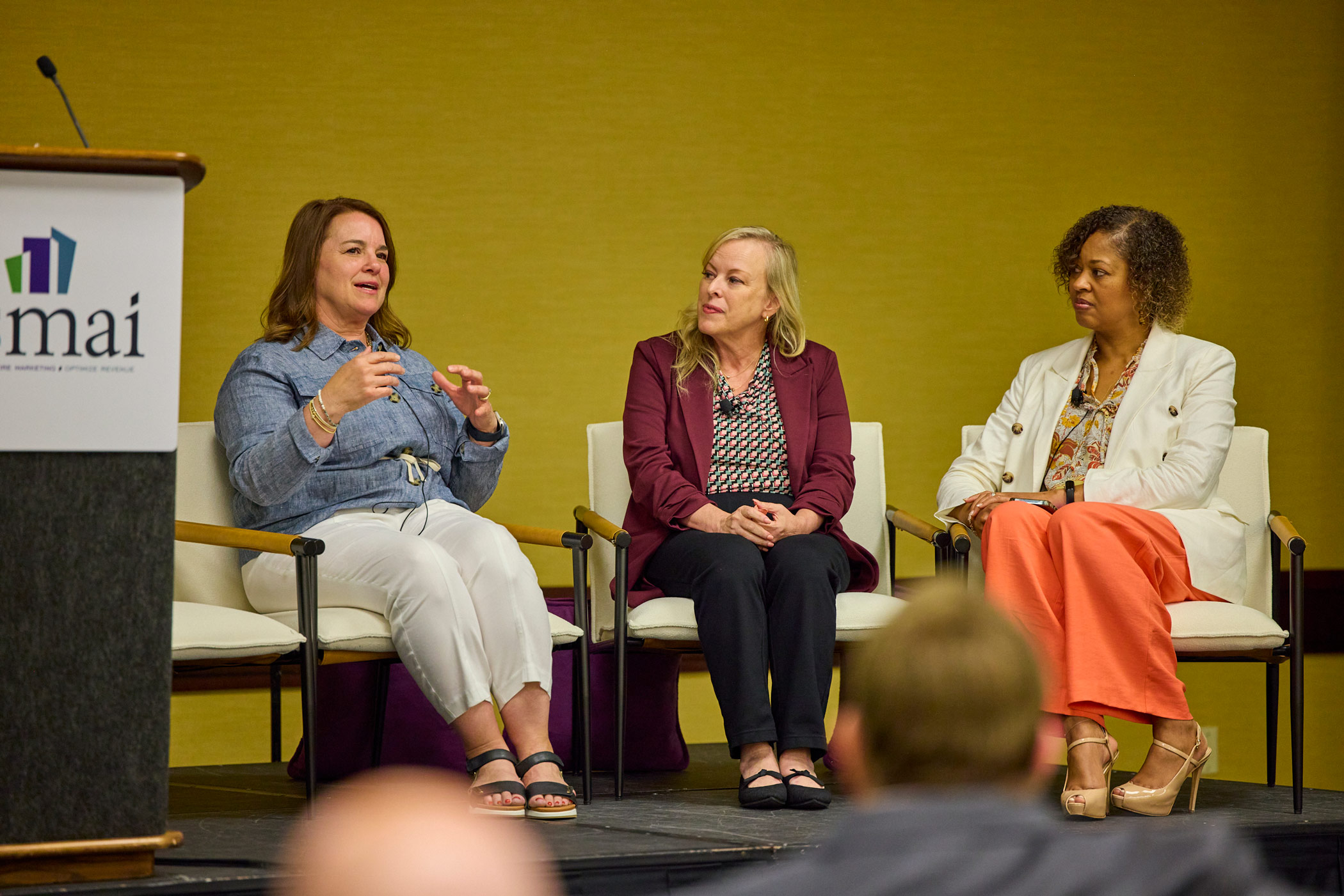 Booking Holdings' Betsy Steckler, Expedia Group's Julie Kyse and Crescent Hotels and Resorts' Erica Lipscomb speak at the 2025 HSMAI Commercial Strategy Conference. (John Bragg/HSMAI)