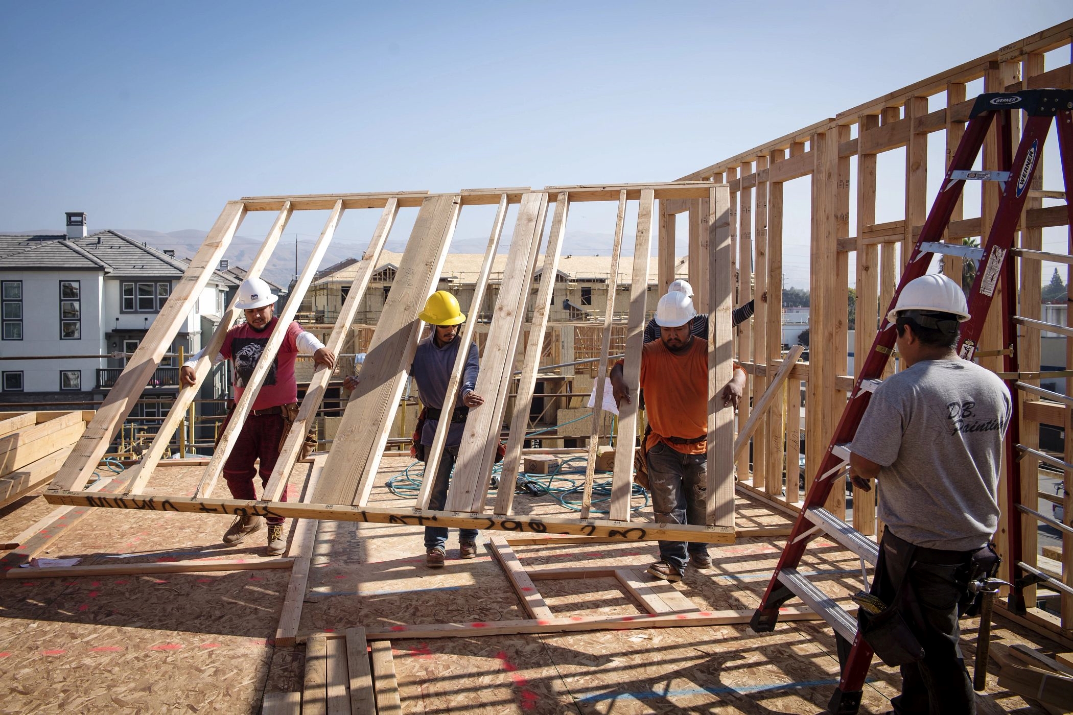 Single-family homebuilding led gains as total U.S. construction spending topped month-earlier and year-earlier levels in February, the Commerce Department reported. (Getty Images)