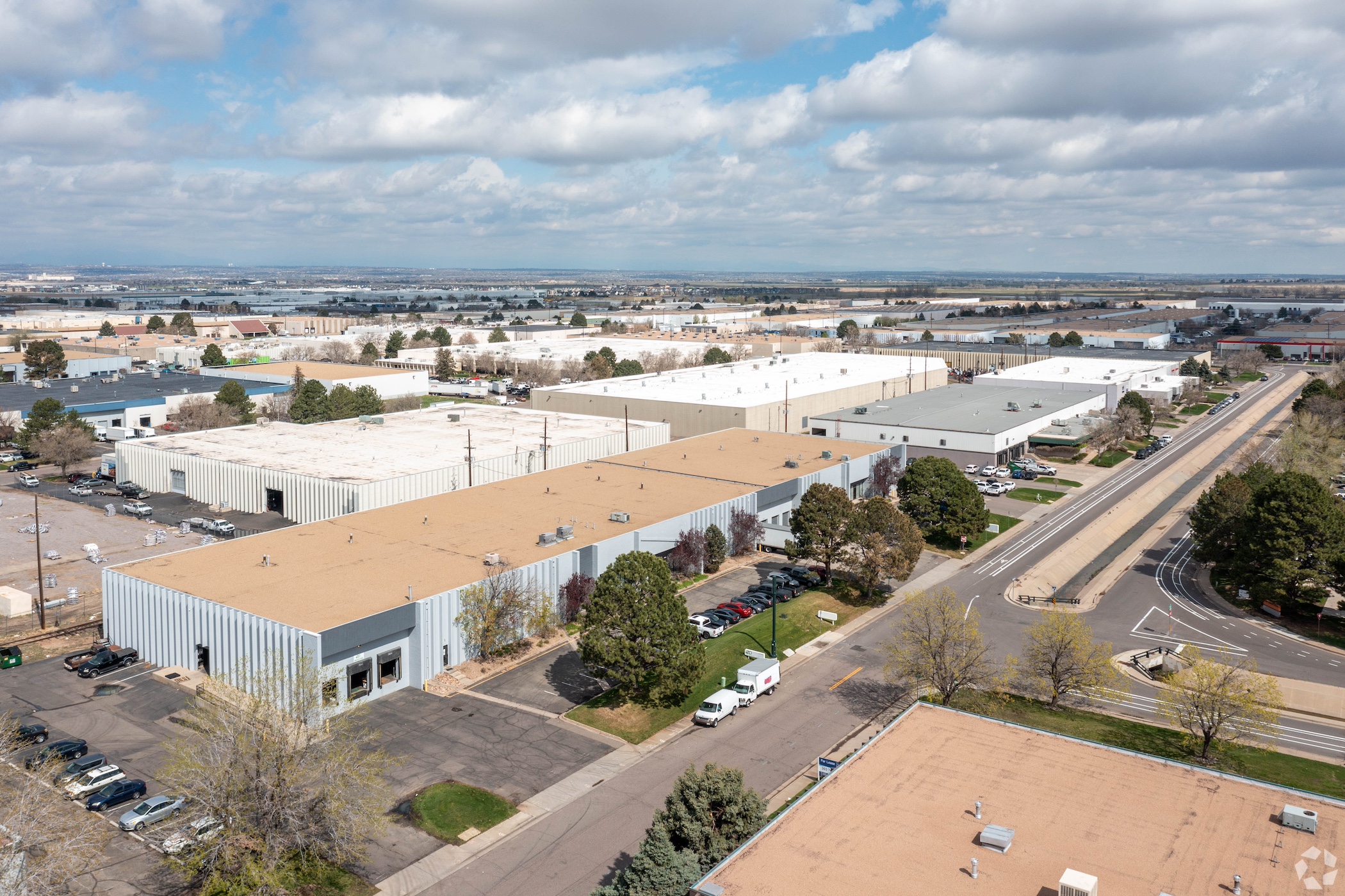 Investcorp and Brennan Investment Group closed on a 31-property portfolio deal that included the buildings in Denver’s Montbello Industrial Park. (CoStar) 