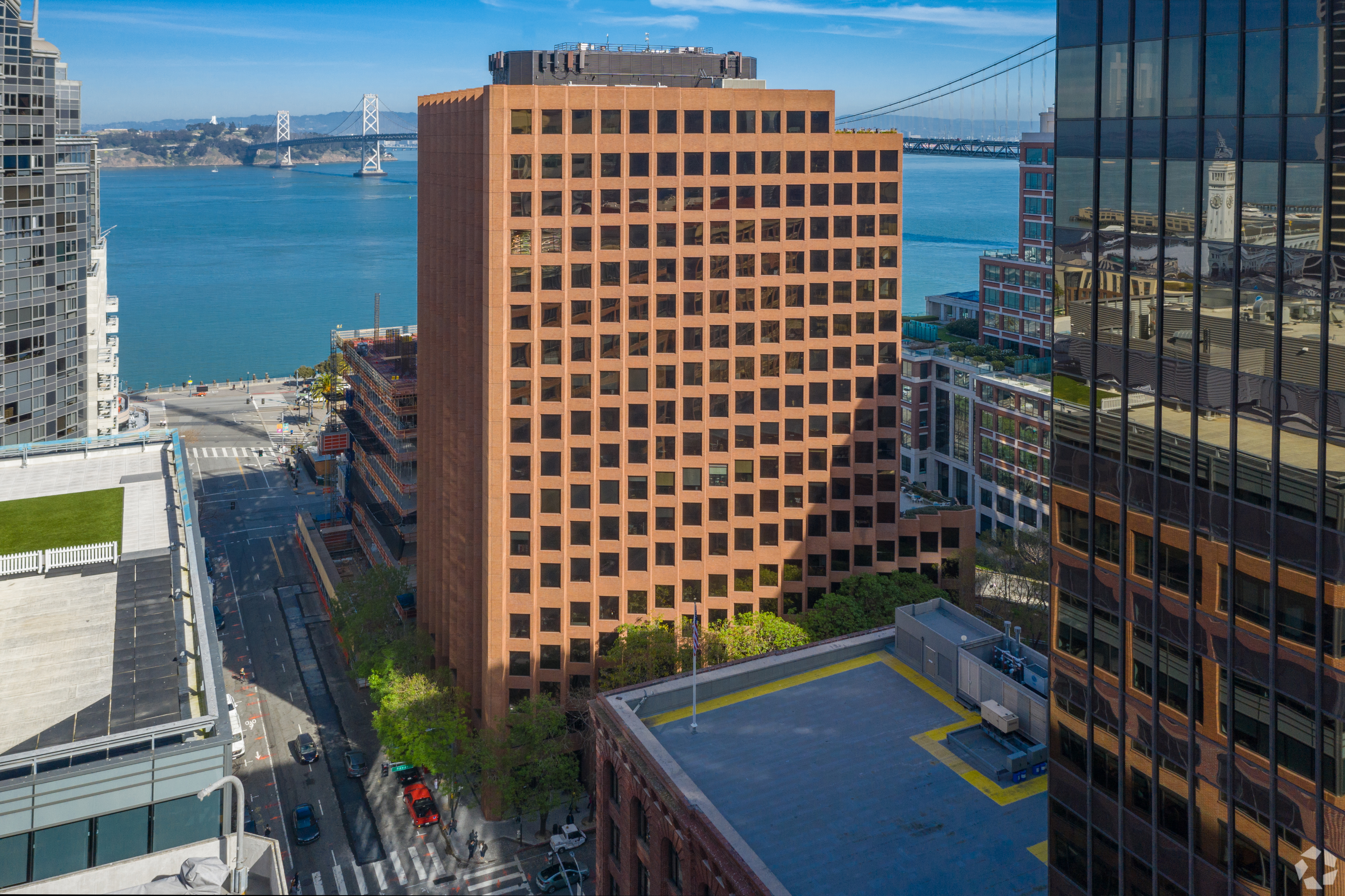 KBS Real Estate Investment Trust III’s office properties include an 18-story office tower at 201 Spear St. in San Francisco. (CoStar)