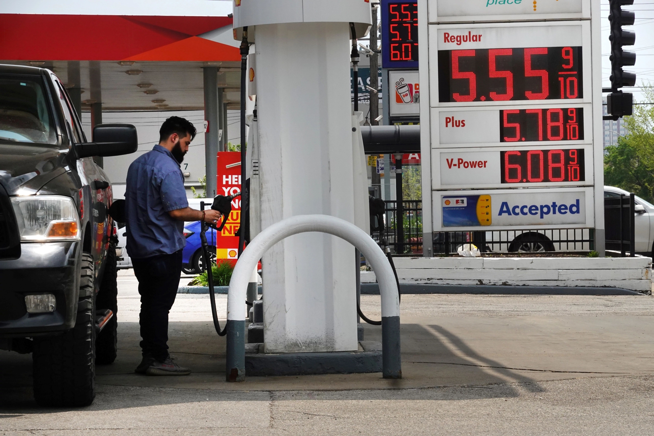 Declining gas prices have helped ease inflation pressures, but costs for food and shelter remain at historically high levels, the government reported. (Getty Images)